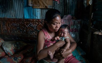 StockCake-Mother holding baby_1723887914