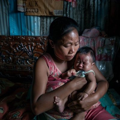 StockCake-Mother holding baby_1723887914
